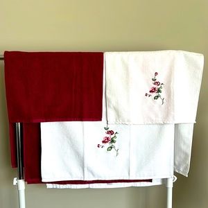 Four piece’s of Mark &spancer brand Towel , white and dark red  %100 polyester